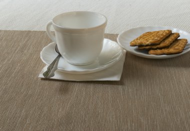 çay Kupası ve çerezler ile fincan tabağı