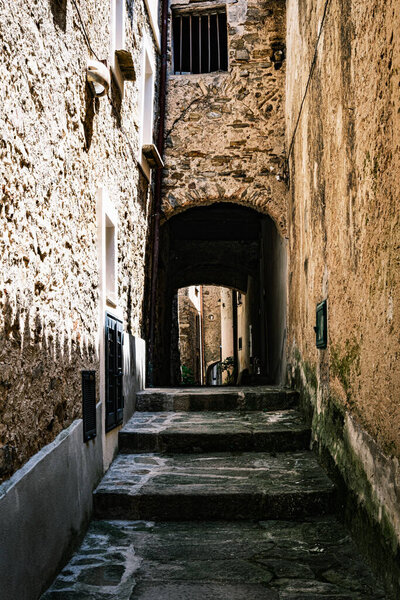 Castellabate, Salerno, Italy. Country lane with stairs and arch