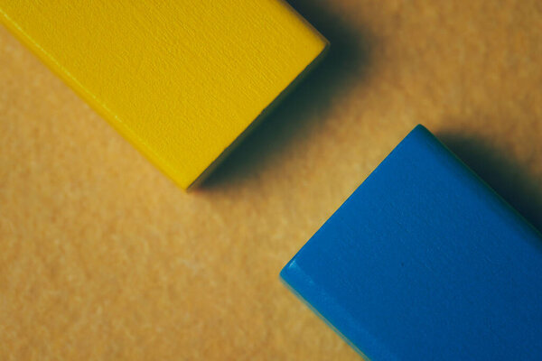 abstract colors. blue and yellow colored shapes on yellow background.