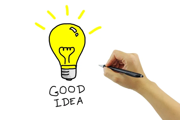 Mano con penna disegno grande lampadina gialla con buona parola idea — Foto Stock