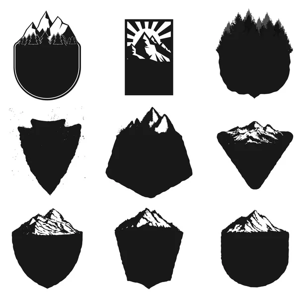 Blank badges templates with mountains and trees isolated on whit — Stock Vector