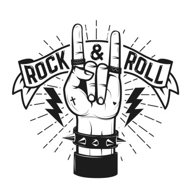 Rock'n Roll tabelası. Ağır metal işareti olan insan eli. Kaya ve r