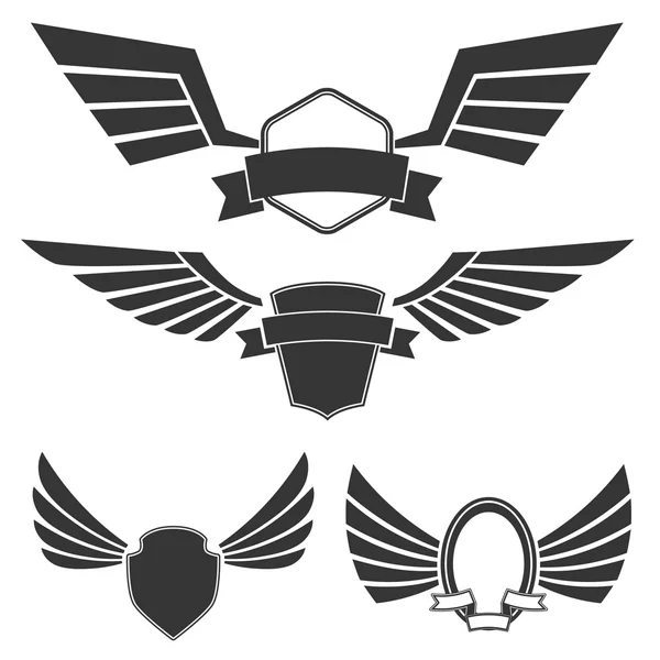 Emblemas con alas — Vector de stock