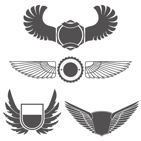 Emblemen met vleugels — Stockvector