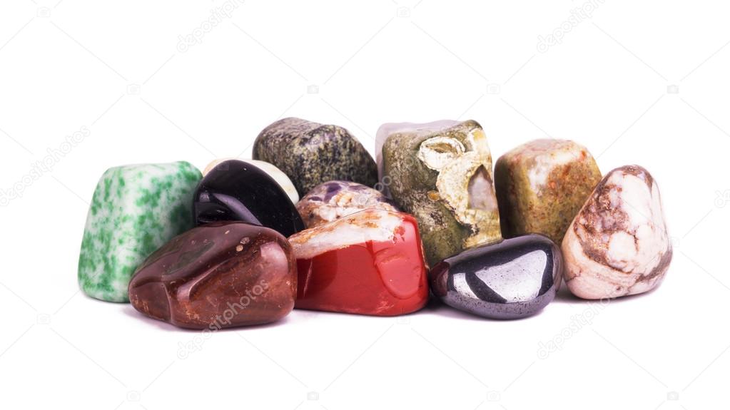 a group of stones of different colors