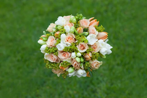 round wedding bouquet with roses