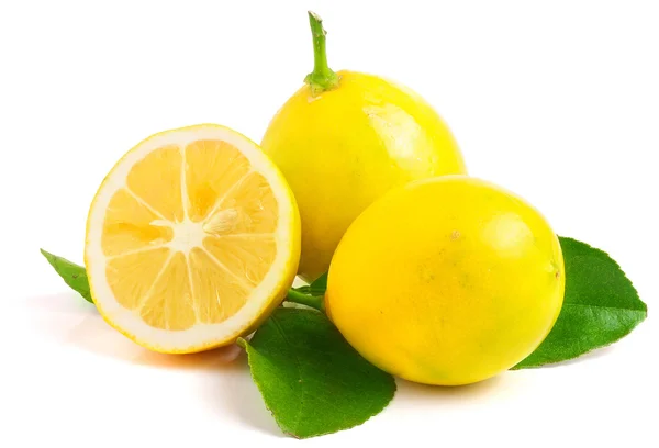 Two Lemons one sliced in half — Stock Photo, Image