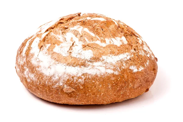 Loaf of freshly baked bread floured on white background — Stock Photo, Image