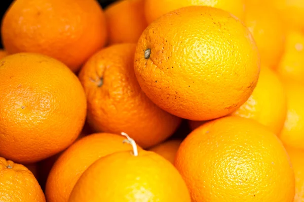 Many oranges on the counter market Stock Picture