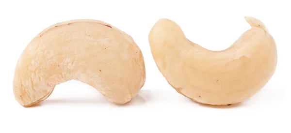 Ein paar Cashewnüsse auf weißem Hintergrund in Großaufnahme — Stockfoto