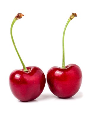 Beyaz arka plan üzerinde izole iki tatlı kiraz portre