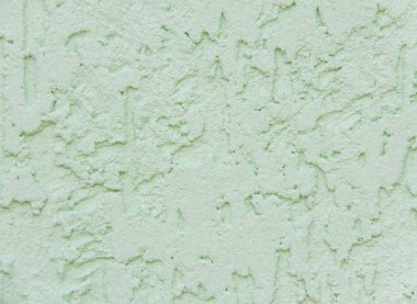 arka plan olarak dekoratif sıva ile yeşil duvar