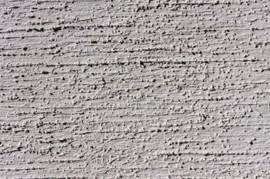 arka plan olarak dekoratif sıva ile gri duvar