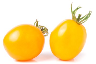 Beyaz arka plan üzerinde izole iki sarı domates