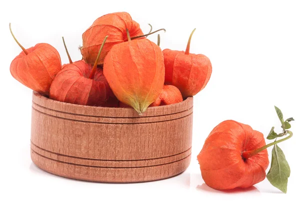 Physalis in wooden bowl isolated on white background — Stock Photo, Image