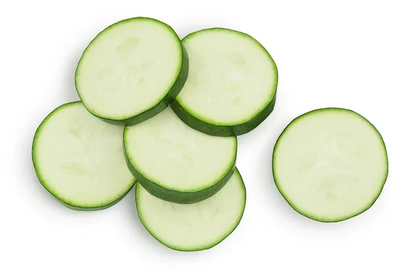 Courgettes fraîches tranchées isolées sur fond blanc avec chemin de coupe et pleine profondeur de champ. Vue de dessus. Pose plate — Photo