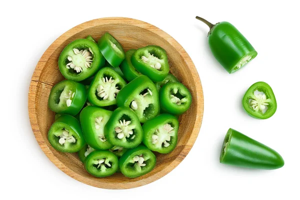 Sliced jalapeno pepper in wooden bowl isolated on white background. Green chili pepper with clipping path. Top view. Flat lay — Stock Photo, Image