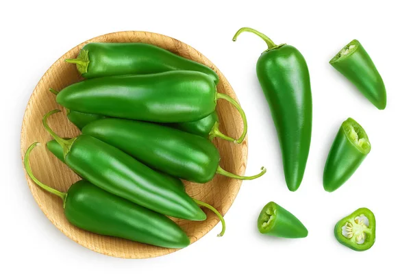 Jalapeno pepper in wooden bowl isolated on white background. Green chili pepper with clipping path. Top view. Flat lay — Stock Photo, Image