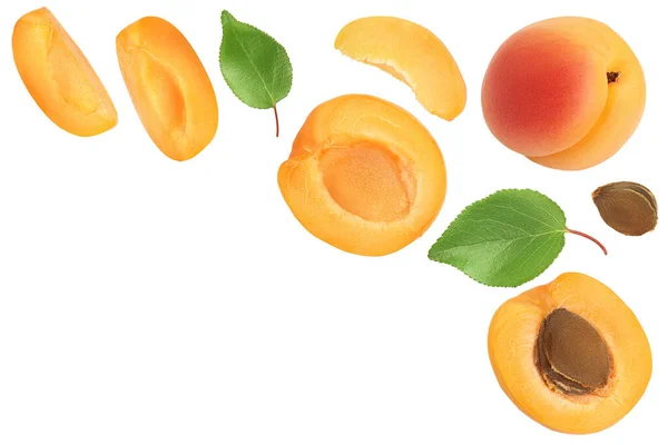 Apricot fruit with half and slices isolated on white background. . Top view with copy space for your text. Flat lay — Stock Photo, Image