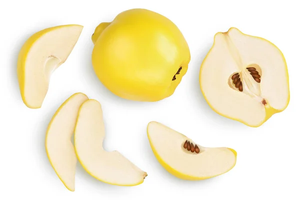 Fresh quince with half and slices isolated on the white background with clipping path and full depth of field. Top view. Flat lay Royalty Free Stock Photos