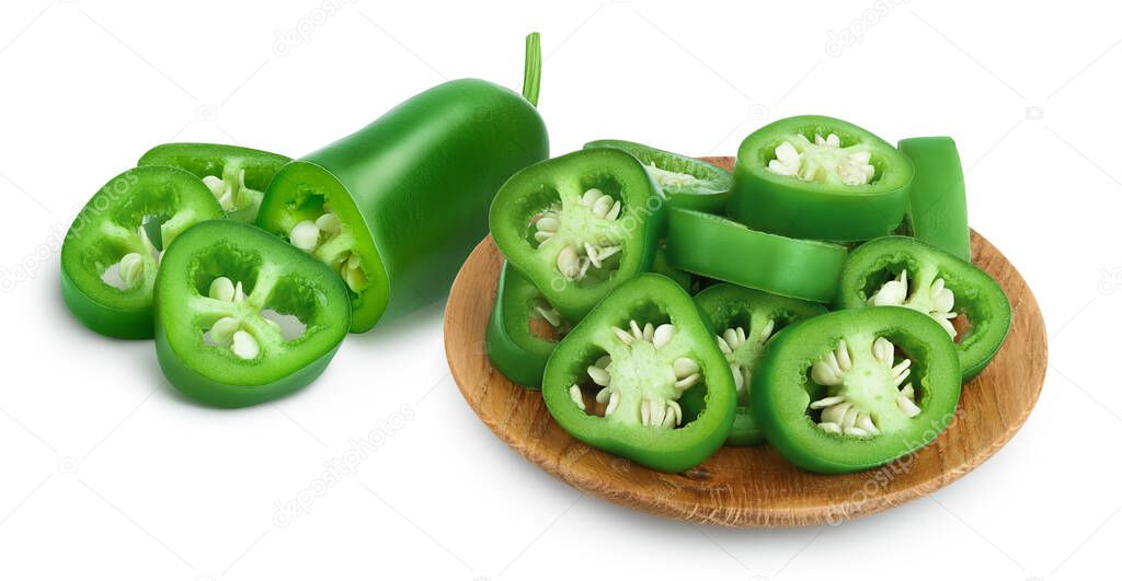sliced jalapeno pepper in wooden bowl isolated on white background. Green chili pepper with clipping path and full depth of field.