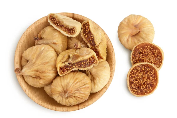 Dried fig in wooden bowl isolated on white background with clipping path and full depth of field. Top view. Flat lay — Stock Photo, Image