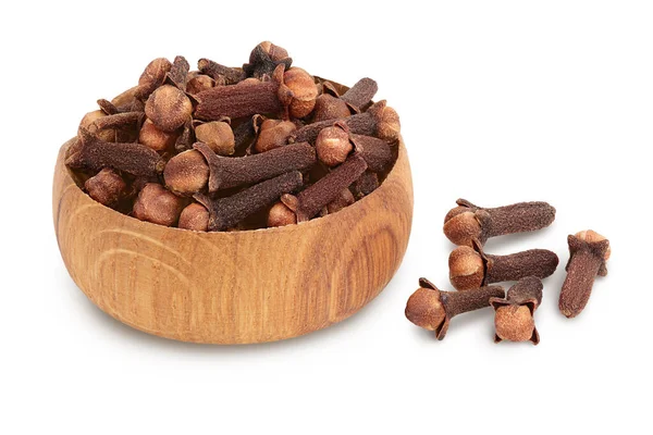 Dry spice cloves in wooden bowl isolated on white background with clipping path and full depth of field. — Stock Photo, Image