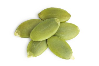 Kabak tohumları beyaz arka planda izole edilmiş. Üst Manzara. Düz yatıyordu.