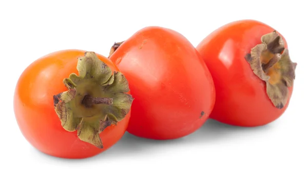 Τρεις ολόκληρο Persimmons — Φωτογραφία Αρχείου