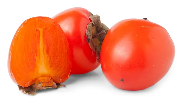 Two Whole And One Half Persimmons — Stock Photo, Image