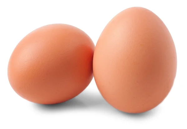 Deux œufs isolés sur fond blanc — Photo