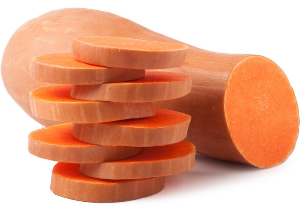 Тыква и ломтики на белом фоне
