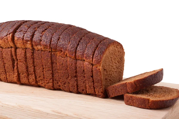 Rodajas de pan integral de trigo sobre fondo blanco — Foto de Stock
