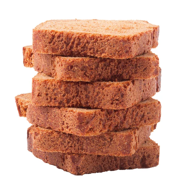 Пшеничный коричневый хлеб ломтики на белом фоне — стоковое фото