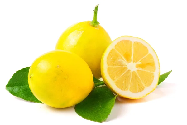 Two Lemons one sliced in half — Stock Photo, Image