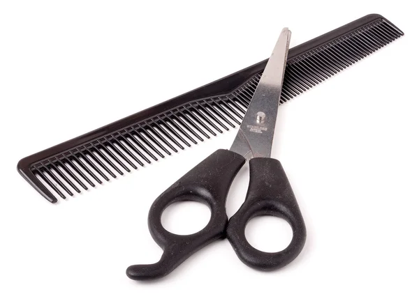 Comb and scissors isolated on the white background — Stock Photo, Image
