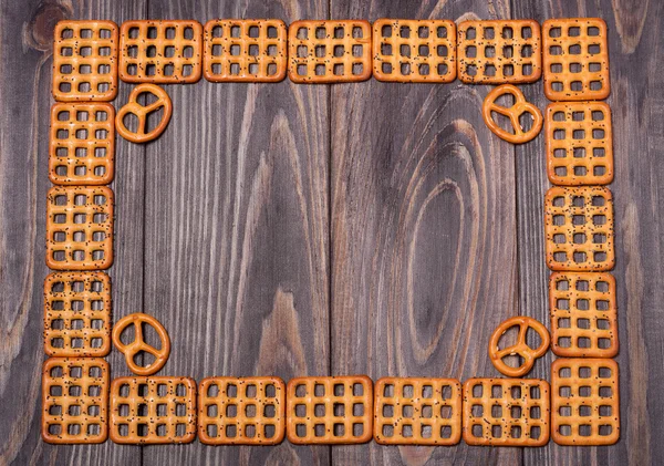 Рамка печива на дерев'яному фоні — стокове фото