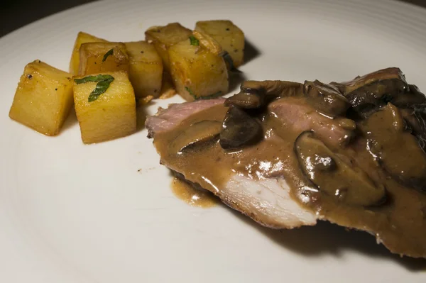 Lamb on a plate with sauce and potatoes — Stock Photo, Image