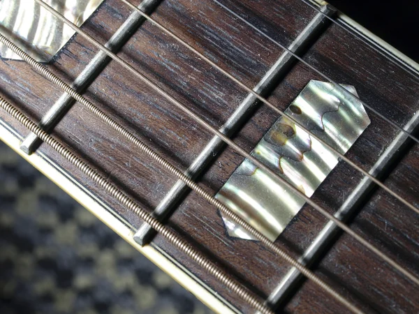 Closeup shot of guitar and strings — Stock Photo, Image