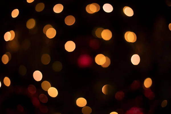 Праздничные Боке Золотые Рождественские Огни Черном Фоне — стоковое фото