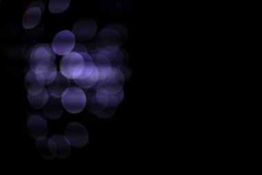 Endüstri soyut bokeh daireleri siyah arkaplan üzerindeki ışıkları kopyalamak için boş alan veya metinleriniz için