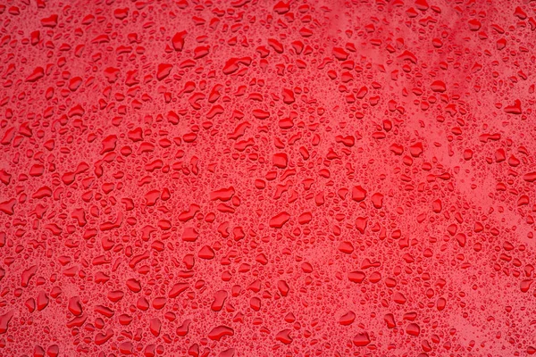 Červená Hladké Pozadí Povrch Vodou Kapky Jednoduchý Vzor Koncept Fotografie — Stock fotografie