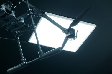 octocopter heavy bomber drone technology tool military equipment work shop occupation research and development result in studio lighting soft focus glare effect war in Ukraine concept
