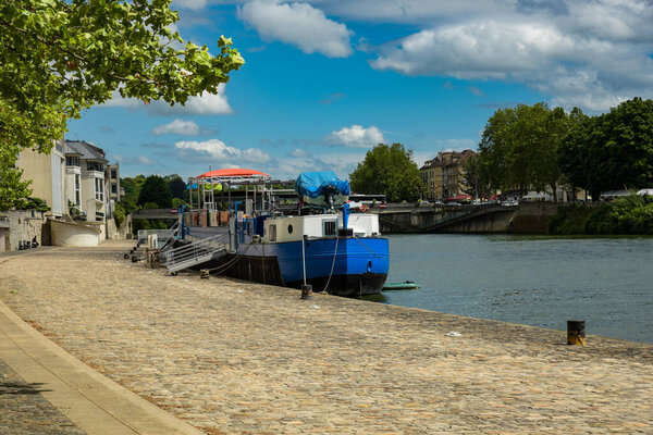 view of the banks of the Seine in the city of Melun in June