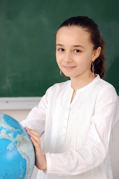 Colegiala en su clase —  Fotos de Stock