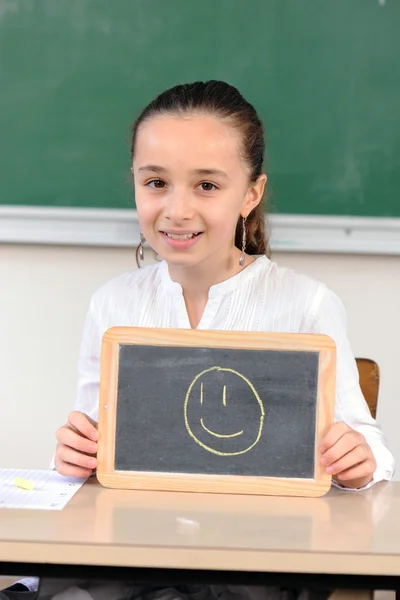 Colegiala en su clase — Foto de Stock