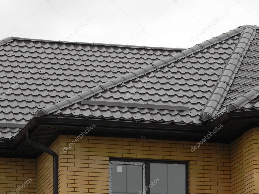 Tile roof metal tiles — Stock Photo © Maxwprosto 75384967