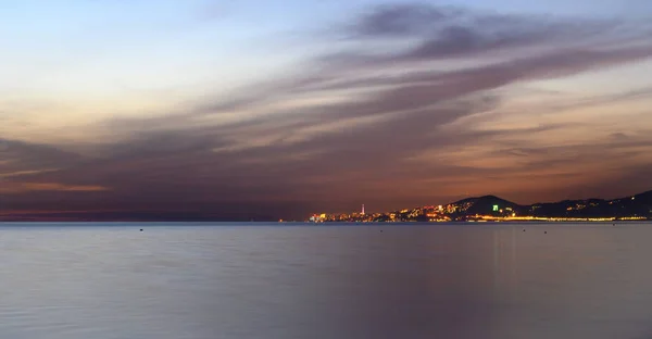 Plain Water Surface Black Sea Dark Clouds Colored Set Sun — Stock Photo, Image