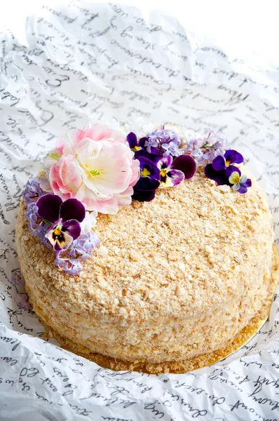 Napoleon cake decorated with flowers