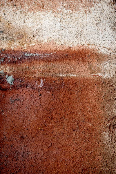 Antigua pared erosionada pintada de naranja — Foto de Stock